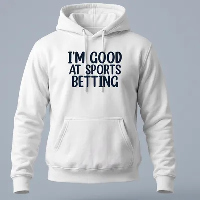 Black t-shirt with bold typography stating I'm Good At Sports Betting. — printed on a unisex hoodie