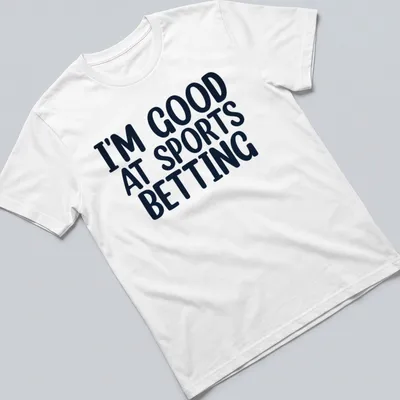 Black t-shirt with bold typography stating I'm Good At Sports Betting.