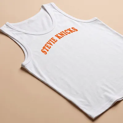 Bold retro Stevie Knicks t-shirt with orange and white lettering — printed on a tank top