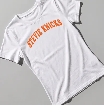 Bold retro Stevie Knicks t-shirt with orange and white lettering — printed on a women's shirt