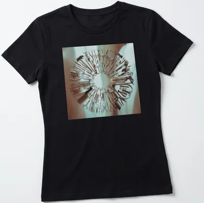Photographic design of surgical tools in a circular arrangement on a T-shirt. — printed on a women's shirt
