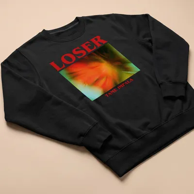 Vintage concert tee featuring 'Loser Tame Impala' in bright colors — printed on a unisex sweatshirt