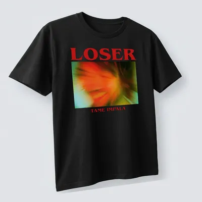 Vintage concert tee featuring 'Loser Tame Impala' in bright colors — printed on a unisex t-shirt (angled view)