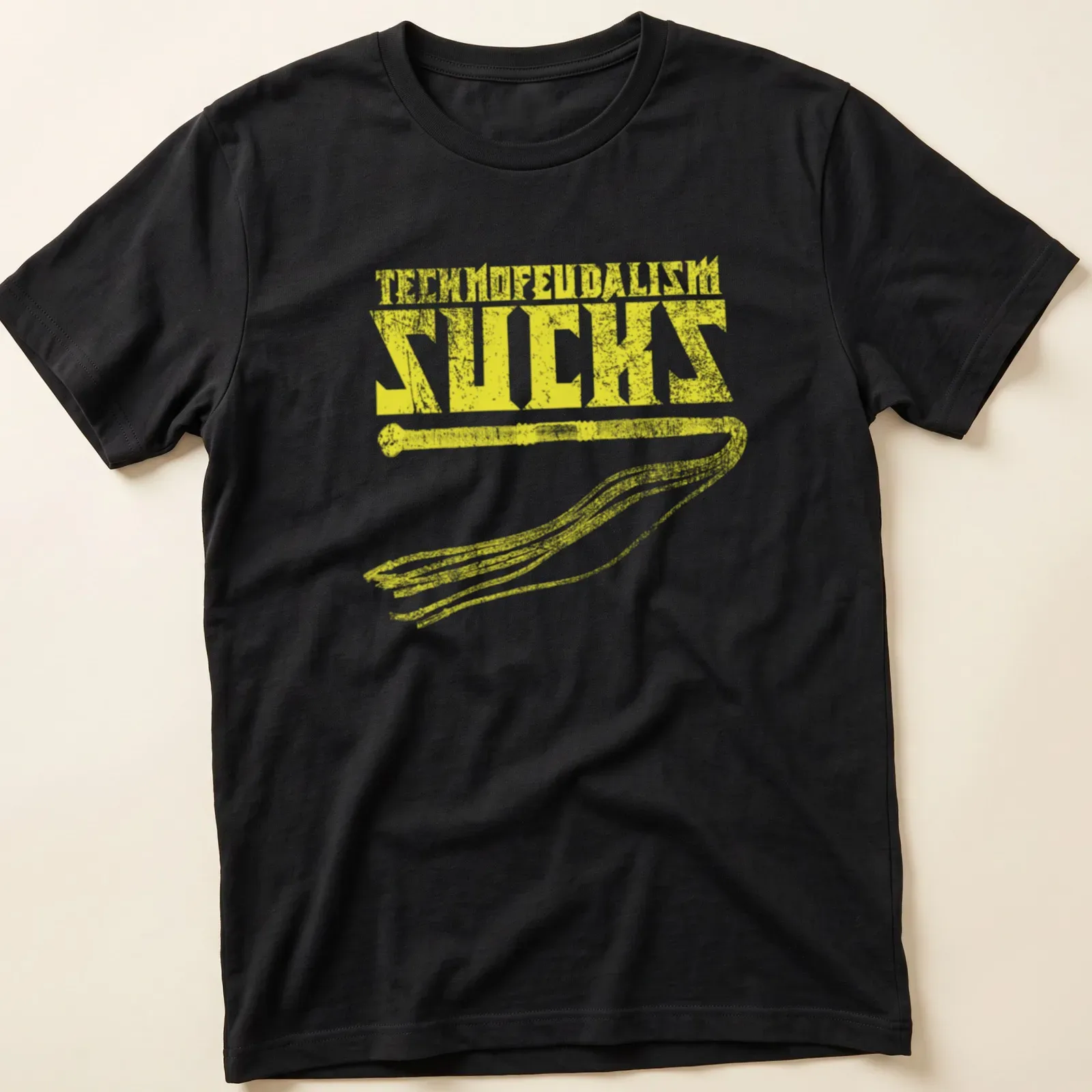 Distressed bold text reads 'Technofeudalism Sucks' with a whip graphic in yellow. — printed on a unisex t-shirt