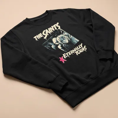 Distressed retro print featuring The Saints with light blue, pink, and cream colors — printed on a unisex sweatshirt