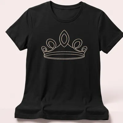 Minimal line art of an elegant tiara in gold on a light beige background — printed on a women's shirt