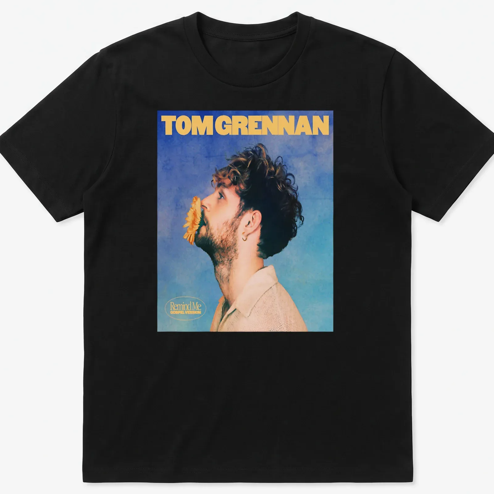 Vintage-style Tom Grennan Gospel Version t-shirt with blue, yellow, and beige colors. — printed on a unisex t-shirt