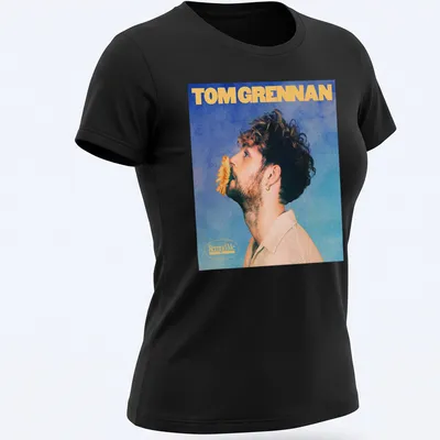 Vintage-style Tom Grennan Gospel Version t-shirt with blue, yellow, and beige colors. — printed on a women's shirt