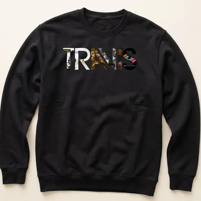 Modern collage Travis logo T-shirt in black, white, gold, pink, and green — printed on a unisex sweatshirt