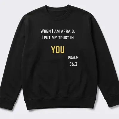 Minimalist design with bold 'YOU' text in yellow and white colors — printed on a unisex sweatshirt