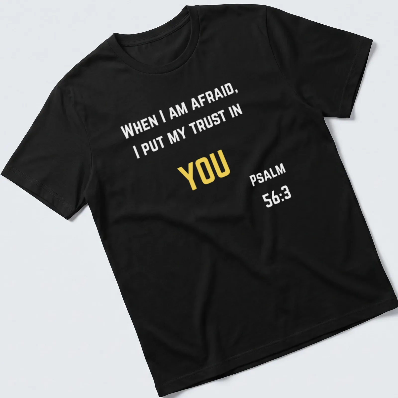 Minimalist design with bold 'YOU' text in yellow and white colors — printed on a unisex t-shirt
