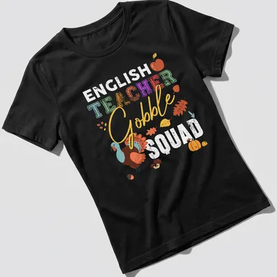 Playful turkey illustration with colorful text 'TEACHER Gobble' for Thanksgiving — printed on a women's shirt