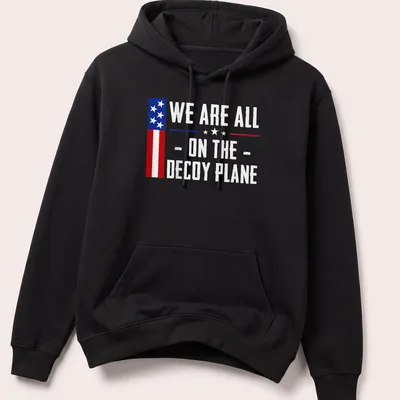 Vintage US flag t-shirt with the text 'We Are All - On The - Decoy Plane' — printed on a unisex hoodie