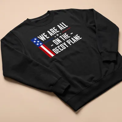 Vintage US flag t-shirt with the text 'We Are All - On The - Decoy Plane' — printed on a unisex sweatshirt