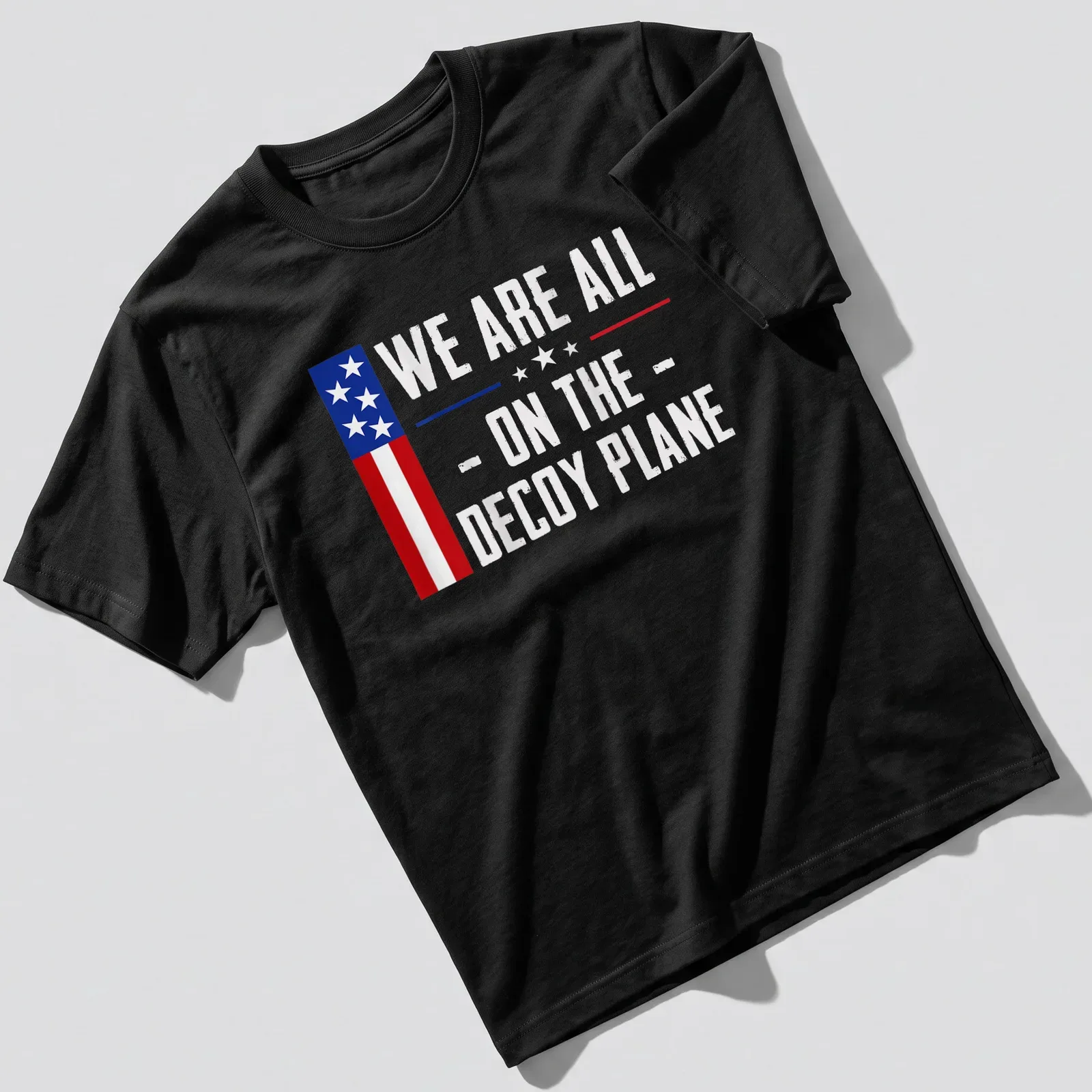 Vintage US flag t-shirt with the text 'We Are All - On The - Decoy Plane' — printed on a unisex t-shirt