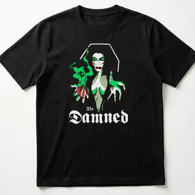 Illustrative Vampira graphic with the text 'The Damned' in green, red, gray, and white — printed on a unisex t-shirt