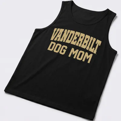 Bold text reading Vanderbilt Dog Mom on a gold background. — printed on a tank top