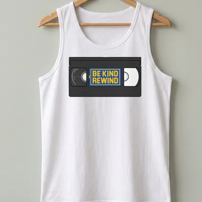 Vintage VHS tape graphic with 'Be Kind Rewind' text in black, yellow, blue, and white. — printed on a tank top