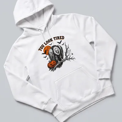 Vintage Halloween vulture illustration with pumpkin and text reading 'YOU LOOK TIRED' — printed on a unisex hoodie