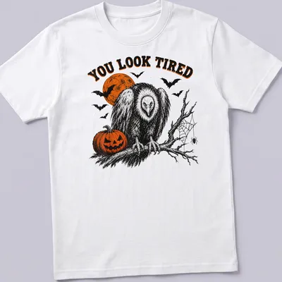 Vintage Halloween vulture illustration with pumpkin and text reading 'YOU LOOK TIRED'