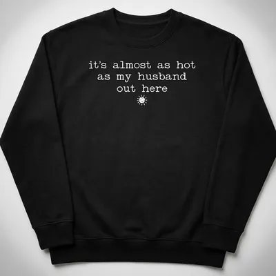 Retro shirt with sun illustration and humorous text about heat and husbands — printed on a unisex sweatshirt