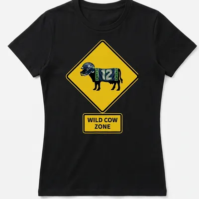 Cartoon cow in a Seattle Seahawks jersey with text 'Wild Cow Zone' in bold letters — printed on a women's shirt