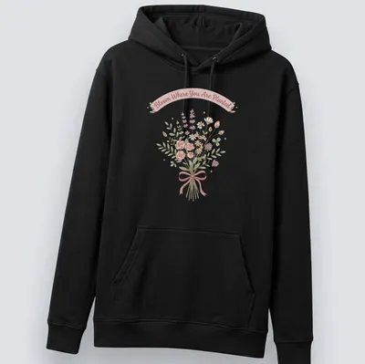 Kawaii line-art wildflower bouquet with the text 'Bloom Where You Are Planted' in pastel colors. — printed on a unisex hoodie