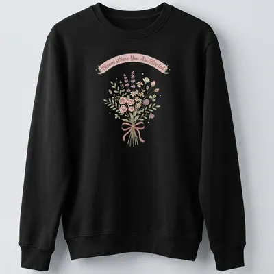 Kawaii line-art wildflower bouquet with the text 'Bloom Where You Are Planted' in pastel colors. — printed on a unisex sweatshirt