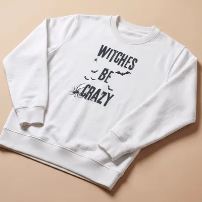 Grunge style Halloween shirt featuring bats, spider, and 'Witches Be Crazy' text. — printed on a unisex sweatshirt