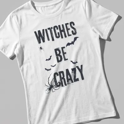 Grunge style Halloween shirt featuring bats, spider, and 'Witches Be Crazy' text. — printed on a women's shirt