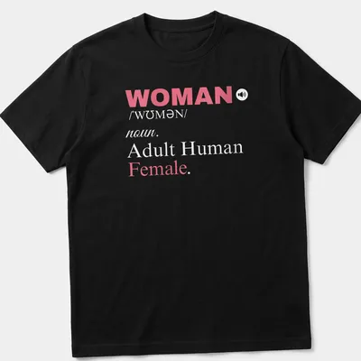 Bold typography t-shirt featuring a definition of womanhood in pink and white