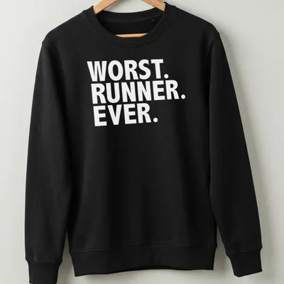 Funny graphic t-shirt depicting struggling runner with humorous text — printed on a unisex sweatshirt